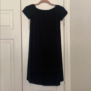 Little black dress with attached cape